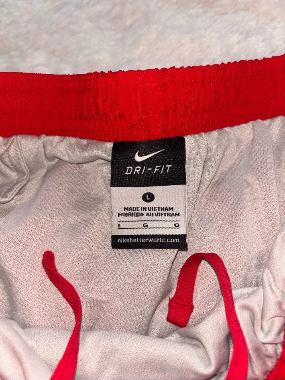 Nike Red Women's Athletic Shorts with White Mesh Trim